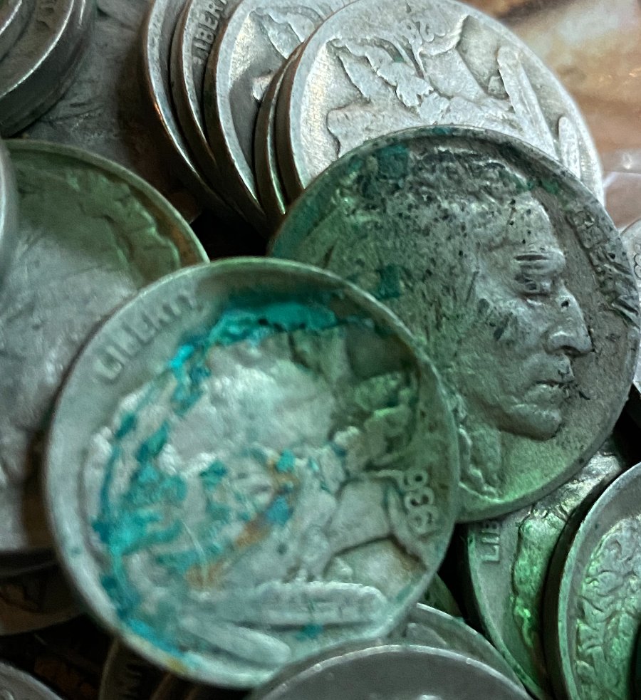 Cleaning-Buffalo-Coins-With-Sticky-Green-Mess
